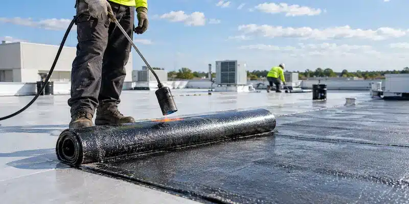 Modified bitumen roofing system on a commercial roof